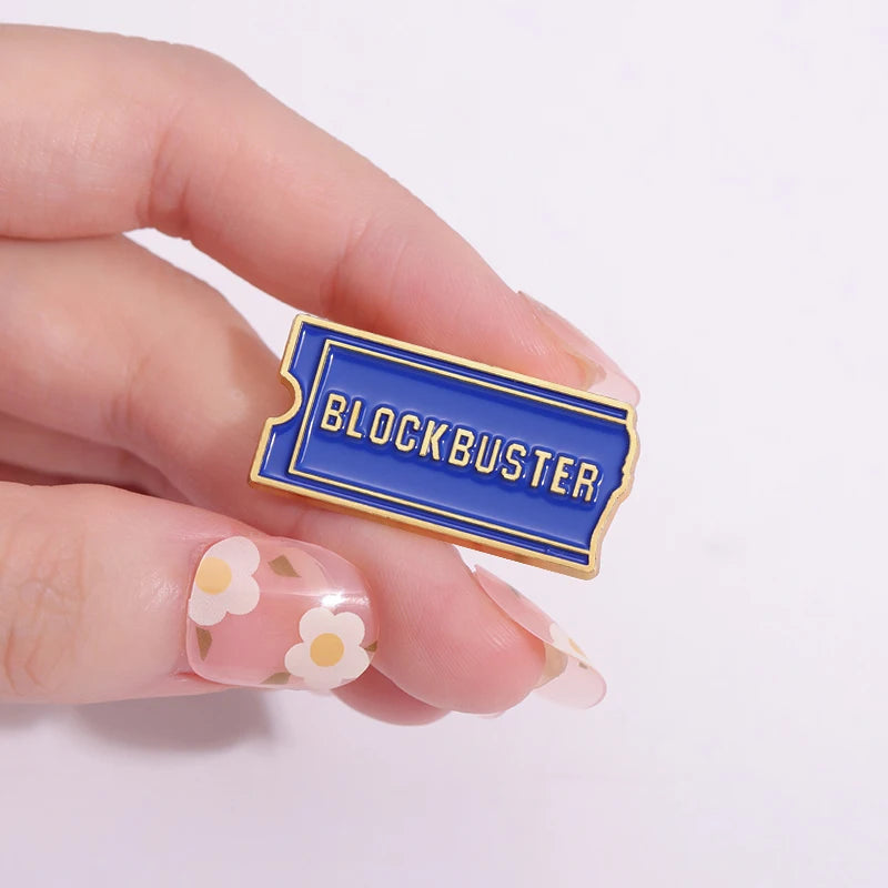 Blockbuster Enamel Pin Hand Pic